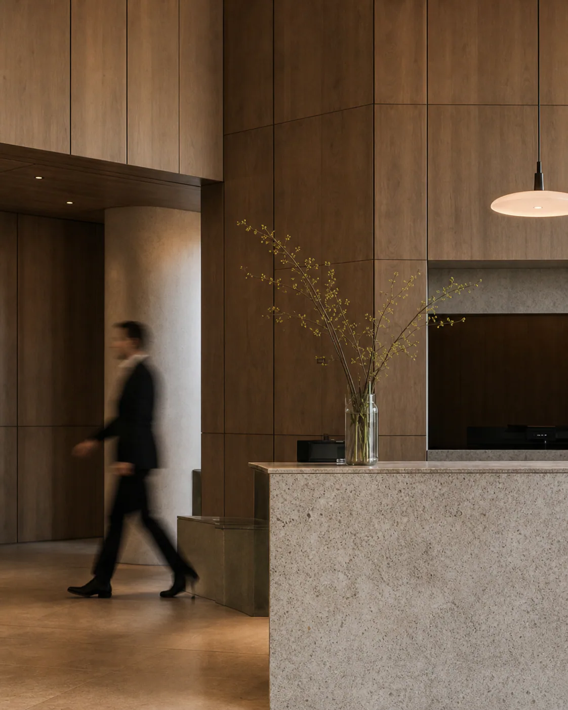 Warm timber and stone workplace lobby