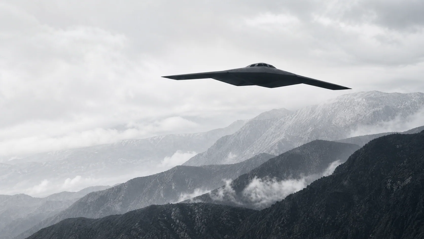 Low-observable aircraft crossing a mountain range