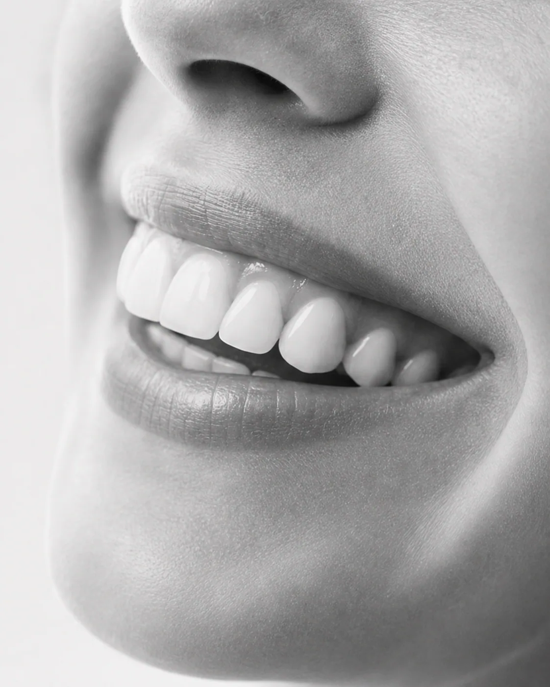 Close-up portrait showing a relaxed, healthy smile