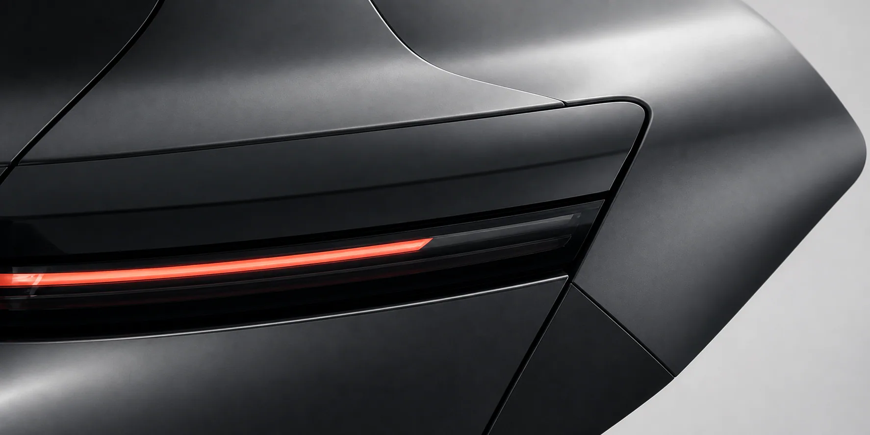 Close detail of the A/01 electric sedan rear light and bodywork