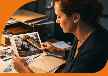 Claims specialist reviewing damage documentation