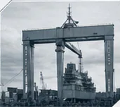 Shipyard gantry crane above a vessel