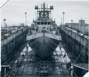 Vessel positioned inside a drydock