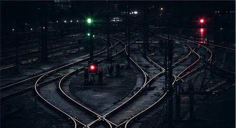 Rail junction at night