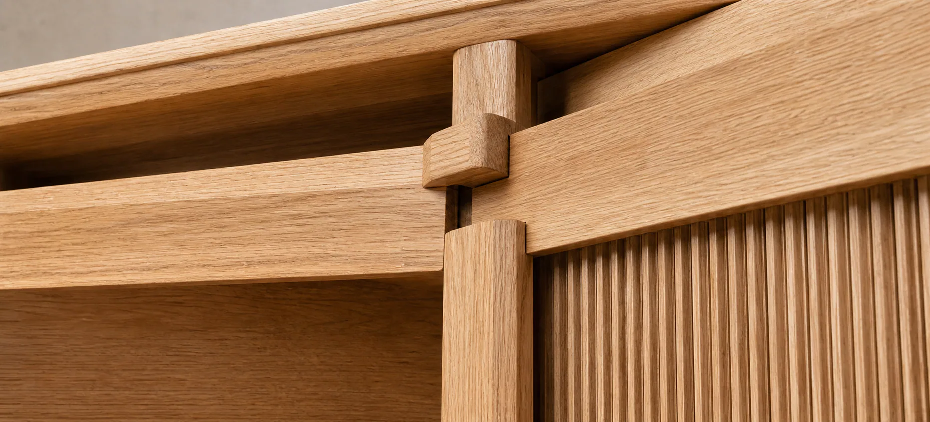 Exposed oak cabinet joinery detail