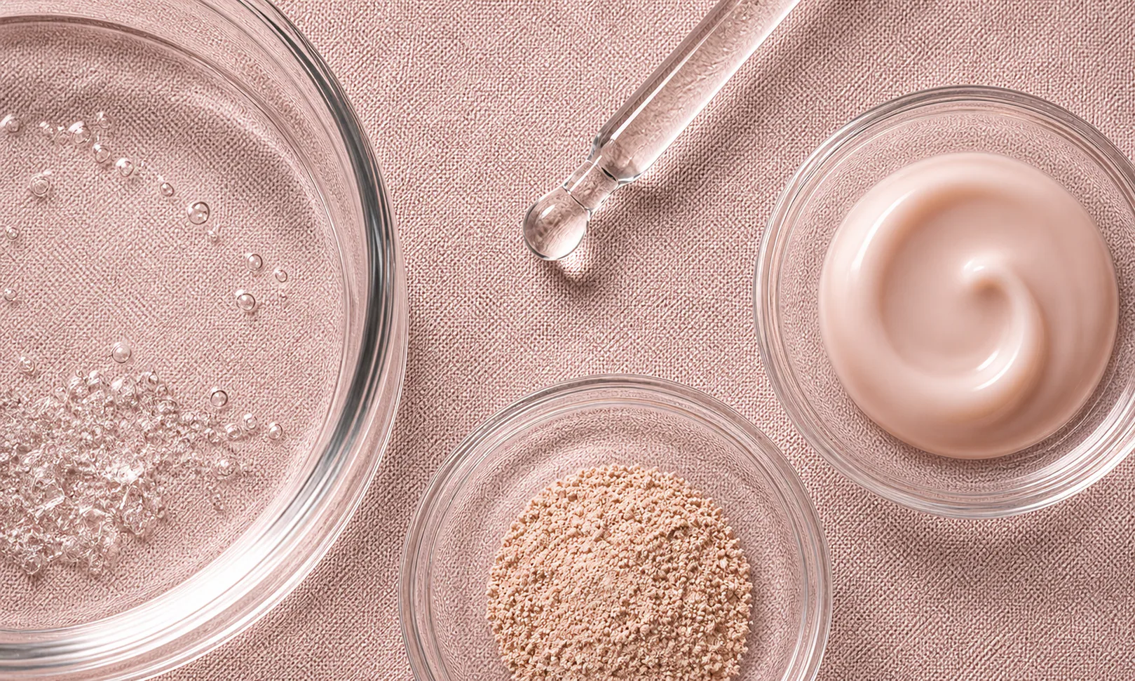 Cosmetic ingredients arranged in petri dishes
