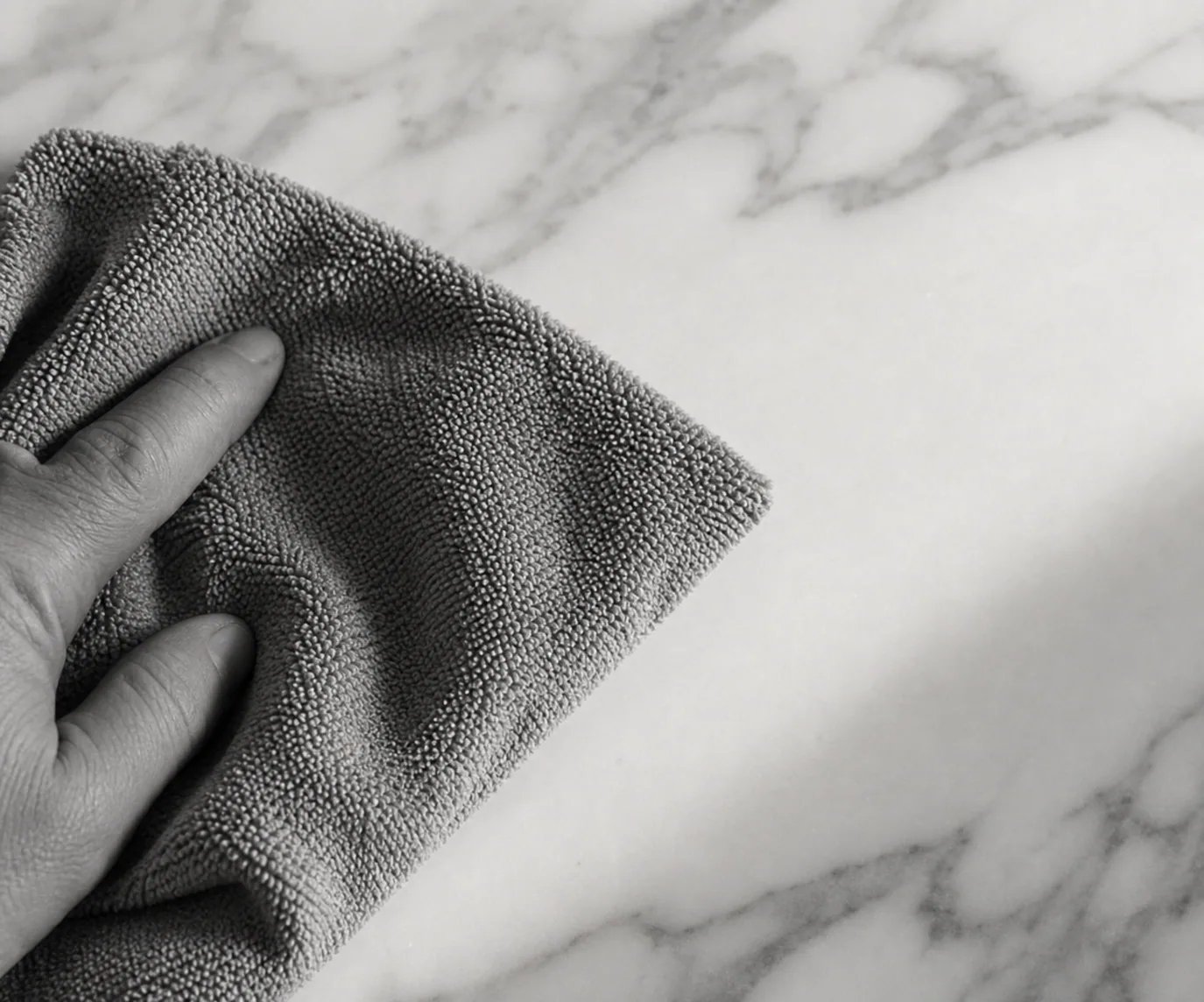 Microfiber cloth polishing pale stone