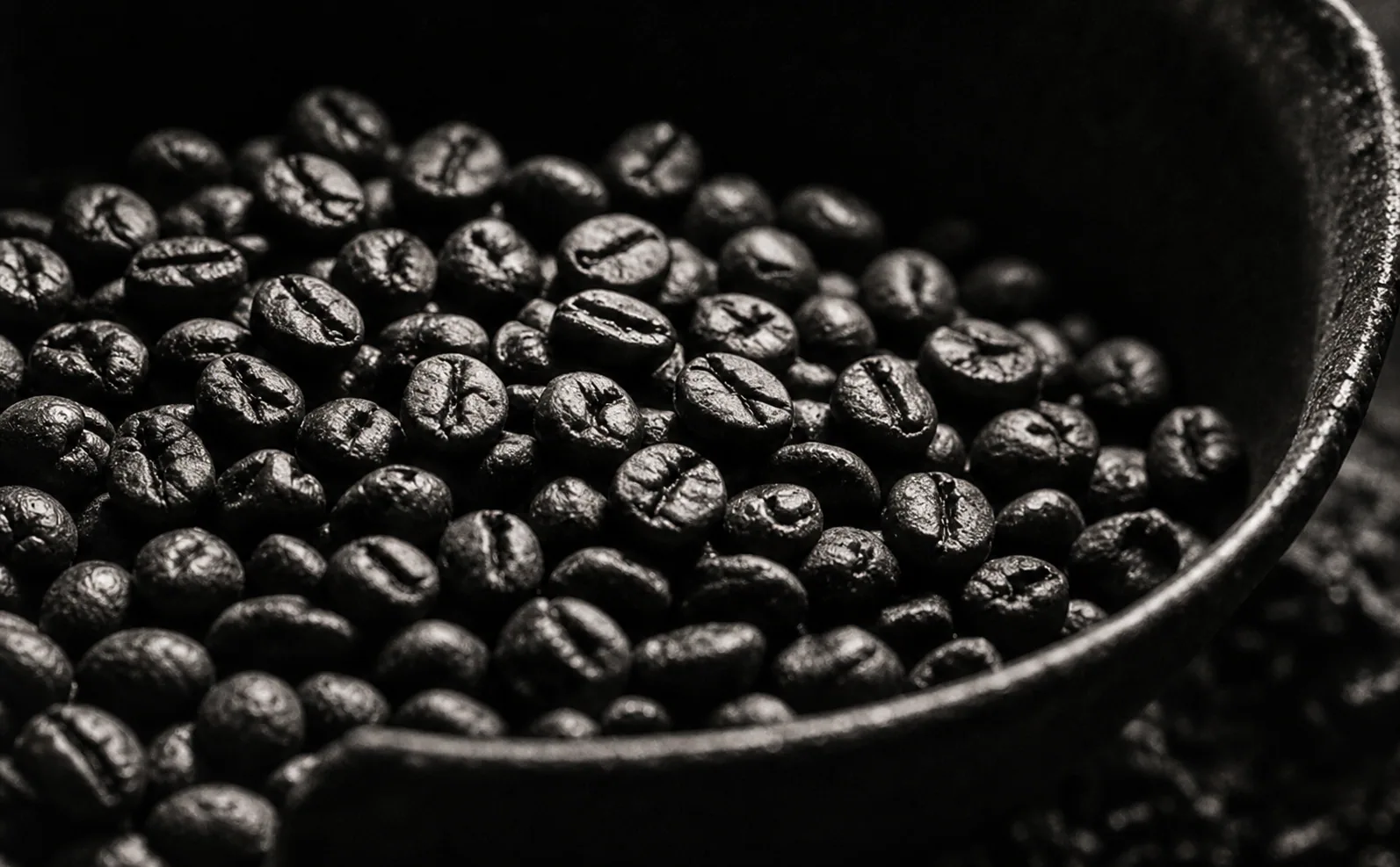Fresh roasted coffee beans with a cool blue treatment