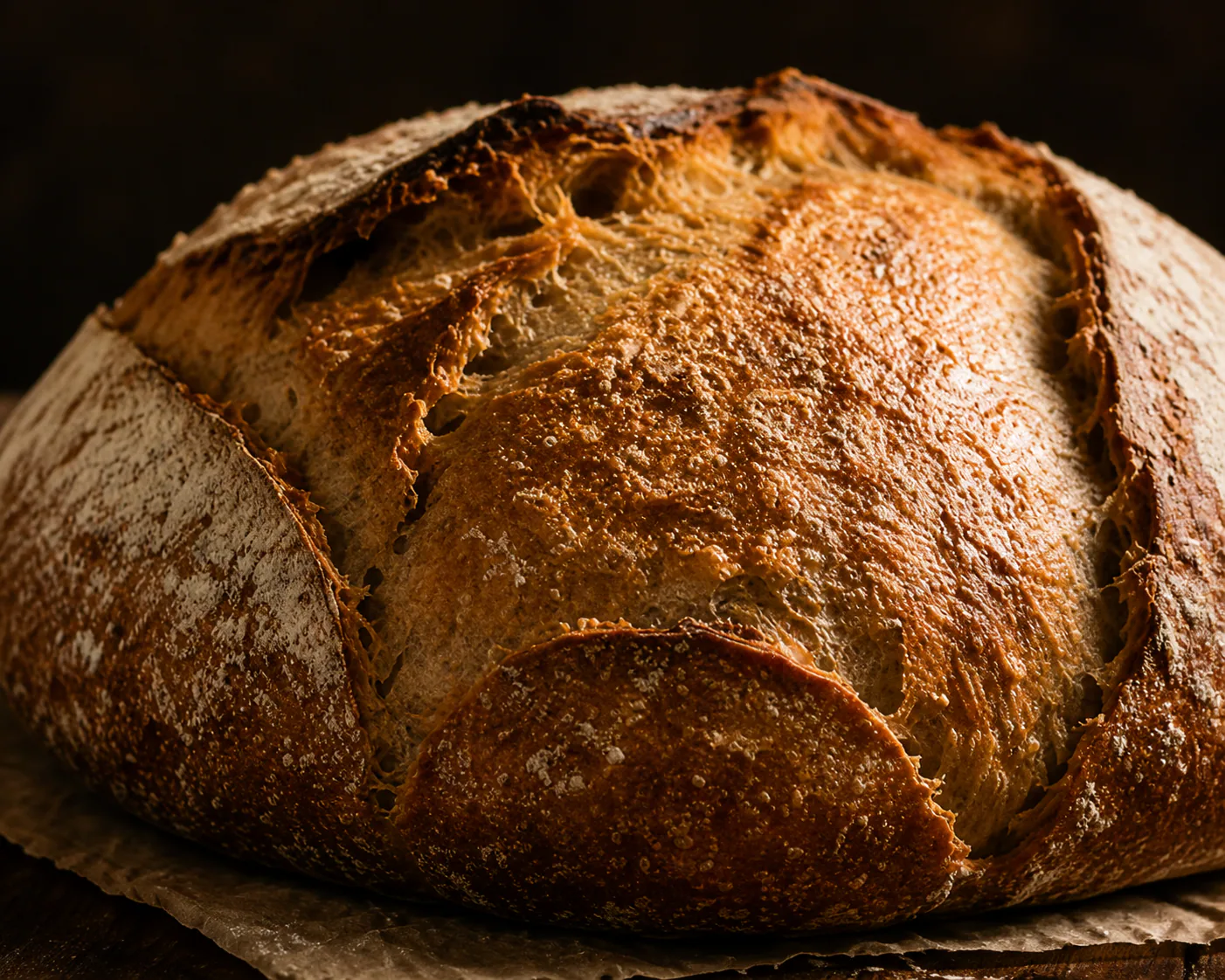 Rustic sourdough loaf on a wooden table