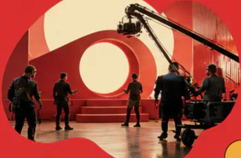 Production crew on a vivid studio set