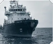 Working offshore vessel at sea