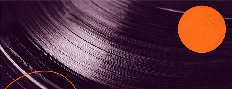 Abstract close-up of a microphone and torn music posters