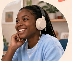 Student wearing headphones during a creative session