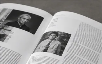 Open editorial spread with photographs and text