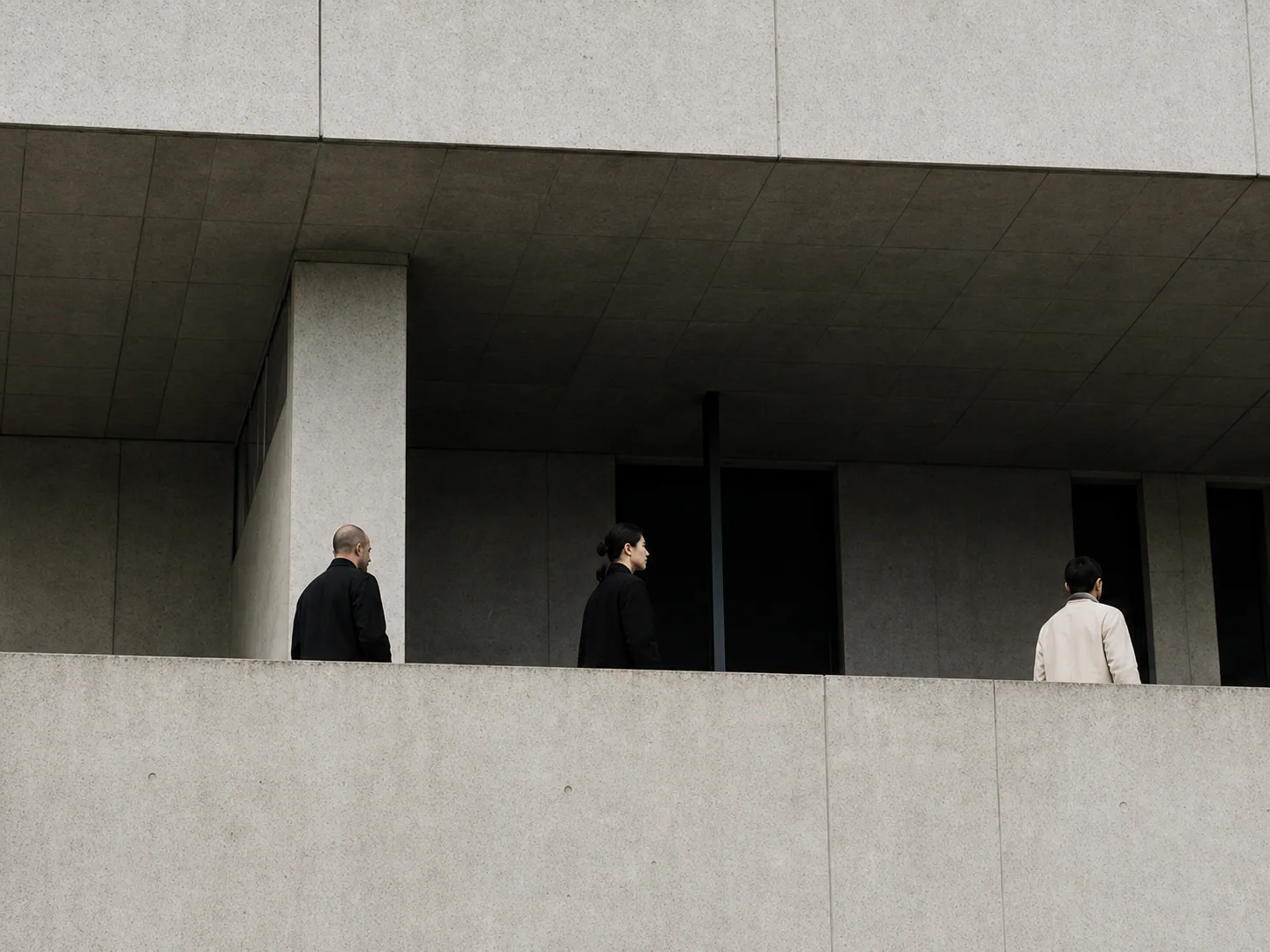 Visitors walking through a monumental cultural building